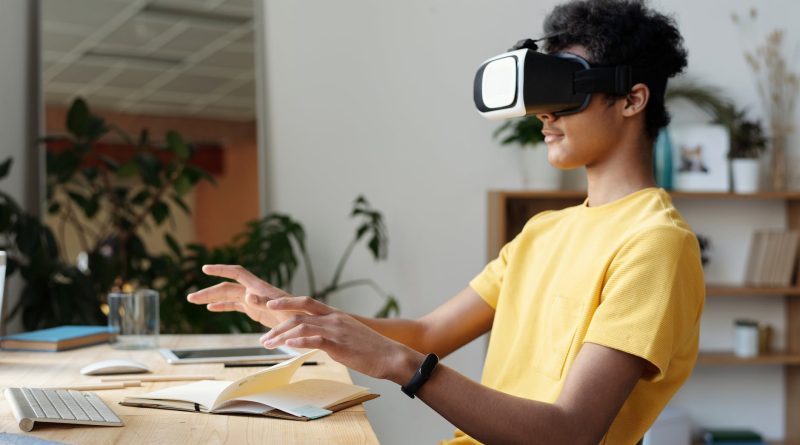 man in yellow crew neck t shirt using vr headset